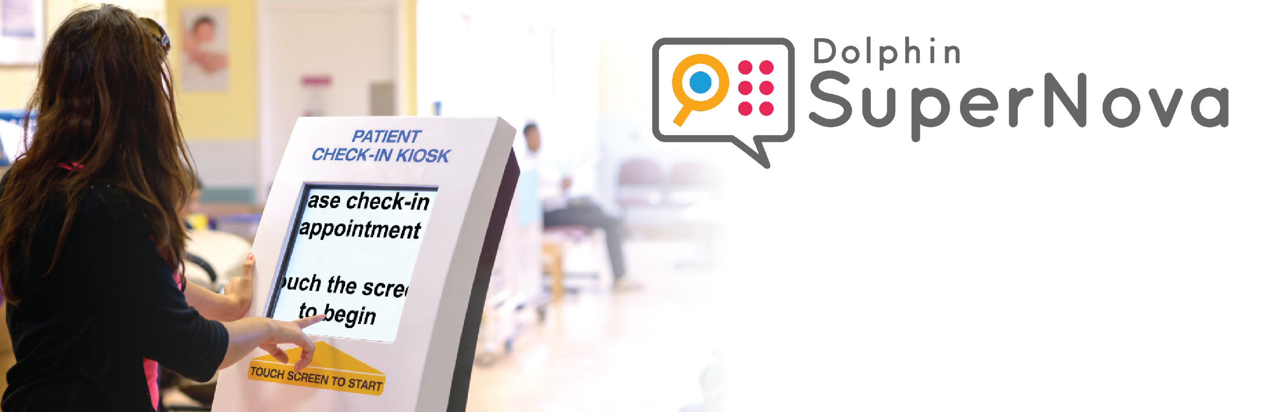 Lady uses a kiosk with magnified text. SuperNova logo. Lady uses a kiosk with magnified text. SuperNova logo.